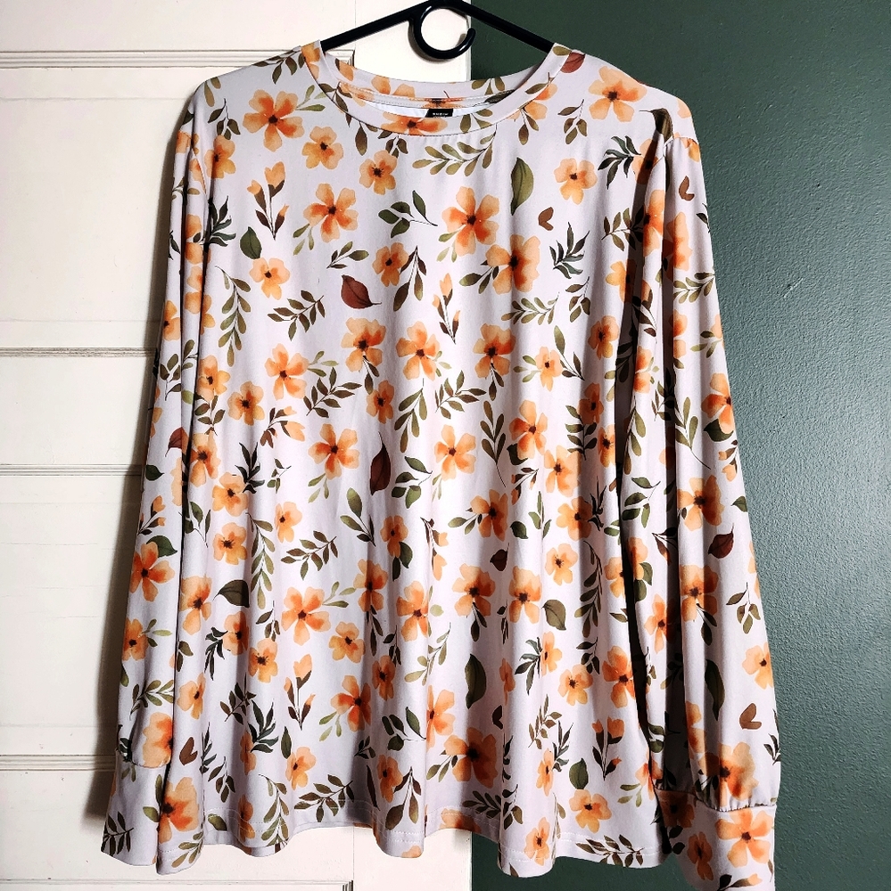 Brand new, floral long sleeve top